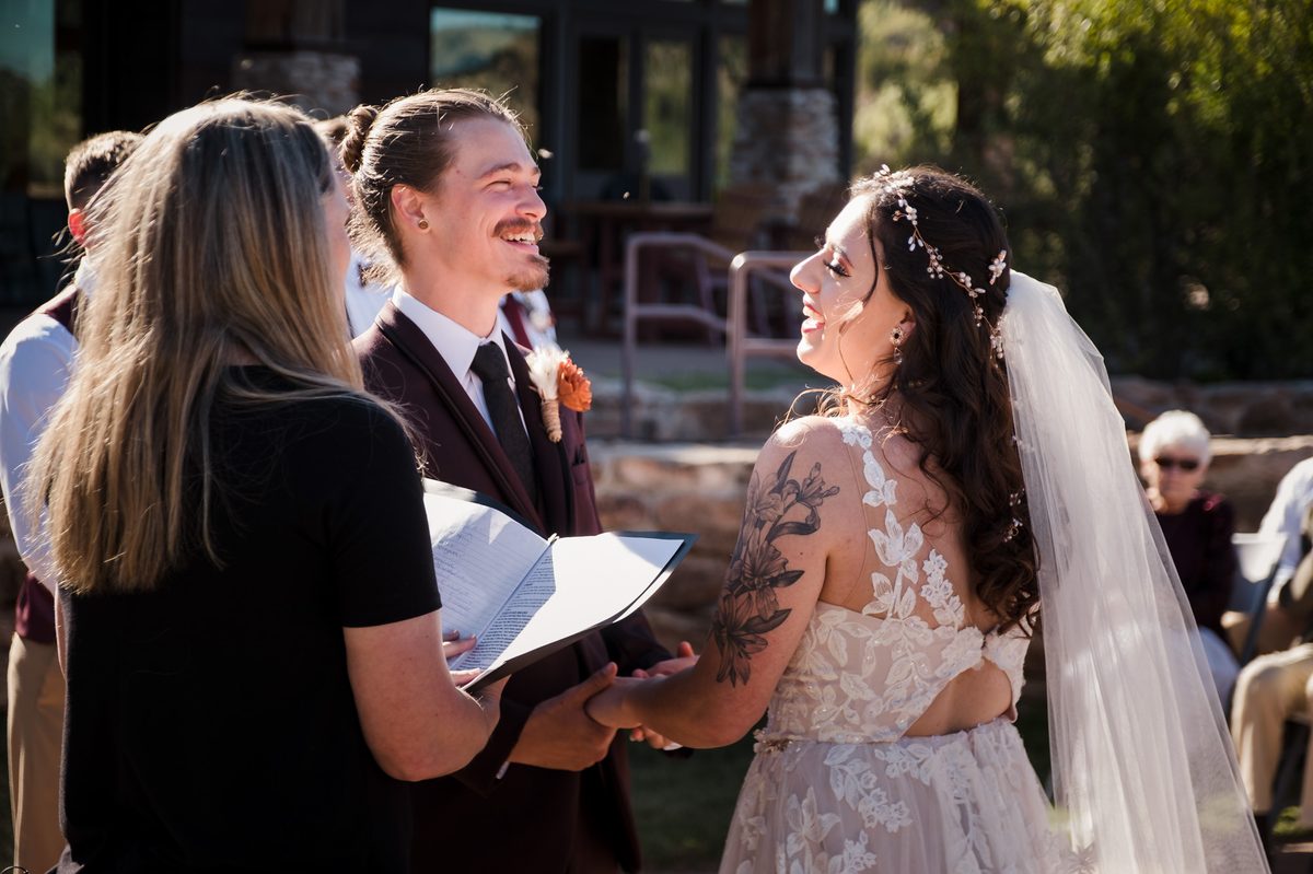 Candid moment during a wedding ceremony at Palo Duro Canyon